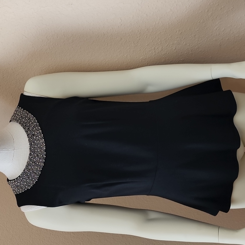 Black blouse , BLACK Saks fifth avenue, size s.